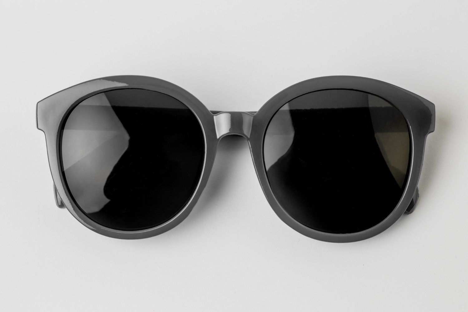 cool-sunglasses-isolated-white-background-top-view